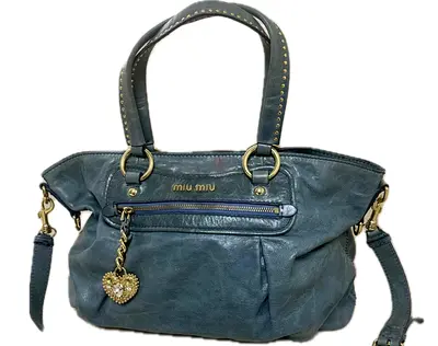 Preloved Miu Miu soft blue leather shoulder bag with heart charm-large