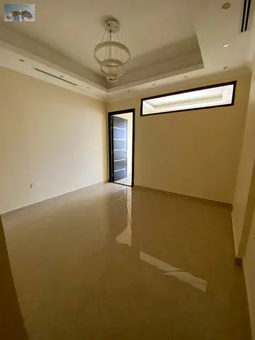 1BR apartment, spacious, balcony, open view, high-end finishing, free parking/free month, prime location, easy Dubai & Sharjah exit.