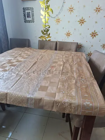 Dining table with table sheet/cover