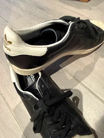 Black Adidas leather sneakers
