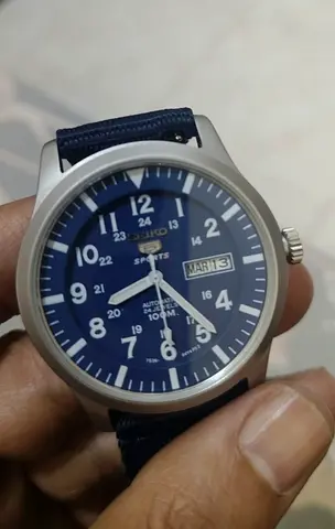 Seiko 5 Sports SNZG11K1 automatic watch with a blue dial and nylon strap. 100m water resistance