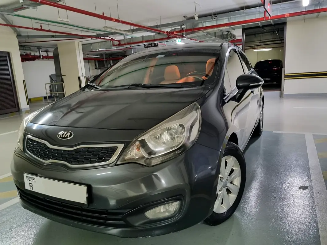 Kia Rio 2013 — photo 1 of 4