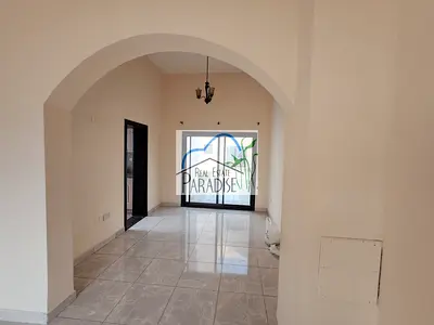 Away from fly zone/ private entrance /3 Bedrooms villa /4 Bathrooms /private back yard/fitted kitchen/4 parking/maid room/available for rent in mirdif