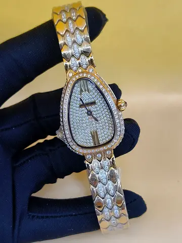 Golden-tone Womens Serpentine Bracelet Master Copy Watch with Full Crystal Dial