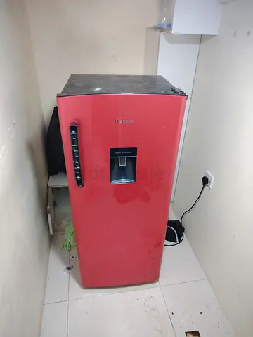 Single-door red mini refrigerator with water dispenser - used