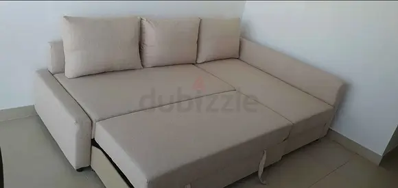 Beige L-shaped Sofa Bed - Good Condition