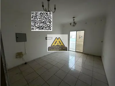 A 1-bedroom apartment with a living room for annual rent in Al Nuaimiya 2 – Ajman, located on King Faisal Street. It features a spacious layout, balco