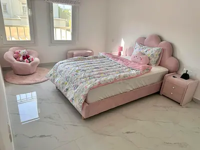 Pink Cloud Kids Bed Frame with Matching Side Tables an Accent Chair