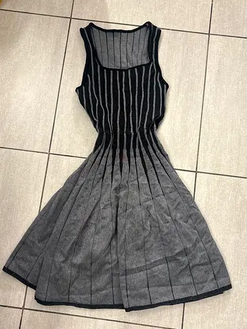 Grey and black sleeveless knit dress, pleated skirt