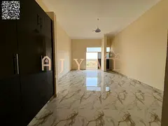 Brand-new 1BR hall in Al Mowaihat 3, 1 month free, balcony, 2 baths, central gas, wardrobes, easy Du