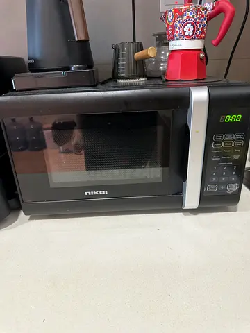 Nikai countertop microwave in good working condition