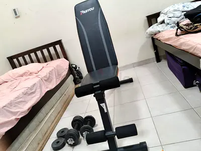 Adjustable weight bench with set of dumbbells