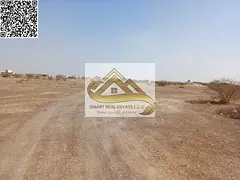 residential land in Manama 8 behind school