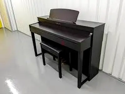 Yamaha Clavinova CLP 430 piano with  bench. As good as new. Cash on free delivery with warranty.