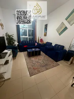 Two-bedroom apartment with a living room, annual rent, on Sheikh Ammar Main Street