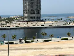 One-bedroom apartment and living room with a sea view on Ajman Corniche in Ajman Corniche. Bathroom