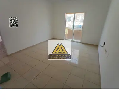 2-bedroom apartment with living room in Al Rawda 3, Ajman. Balcony, 2 bathrooms, central AC, maintenance covered by owner, AED 35,000 in 6 payments, p
