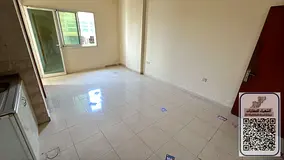 Studio apartment with balcony, excellent space, central air conditioning, on the Dubai and Sharjah e