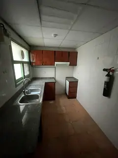 In the heart of Al Qasimia, a distinctive apartment is available for annual rent, suitable for famil