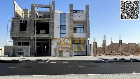 Modern two-story villa with a luxurious rooftop terrace, offered at a special price in Al Zahia, including registration fees.