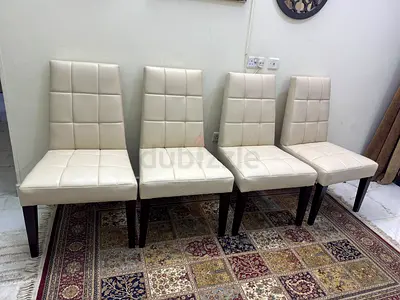 Set of 4 cream pure leather dining chairs with dark wooden legs