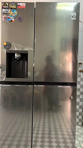 LG Stainless Steel 4-Door Refrigerator with Water Dispenser - Excellent Condition