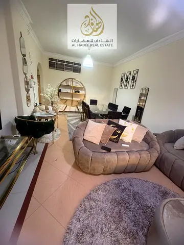 Two bedrooms and a living room, very elegantly furnished, all bills included, spacious, near Al Safir Mall