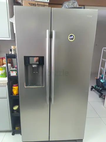 Silver Side-by-Side Refrigerator with Water Dispenser - Good Working Condition