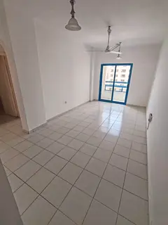 For annual rent in Sharjah 1 bedroom and a living room, balcony, 1 bathroom, and kitchen, with fan a