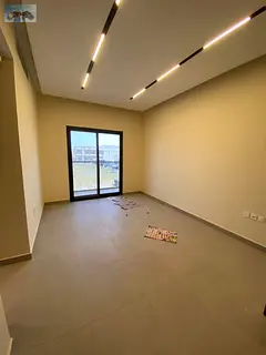 First-tenant 2-bedroom apartment with elegant design, prime location, built-in wardrobes, and centra