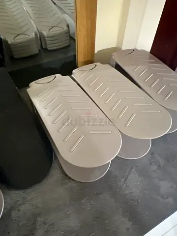 Adjustable plastic shoe holders