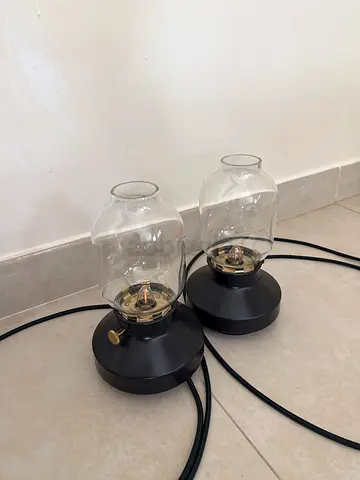 Pair of modern black bedside table lamps with glass shades