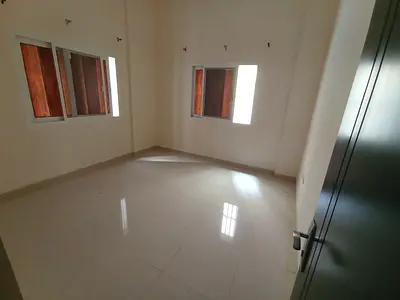 Cheapest one-bedroom apartment for annual rent in Sharjah, Al Butaybah area | Central air conditioning | Ground floor | One bathroom | Strategic locat