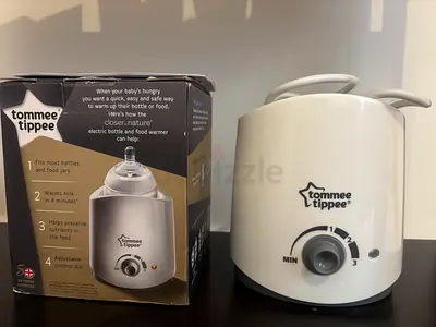 Tommee Tippee Electric Baby Bottle  Food Warmer with instructions booklet