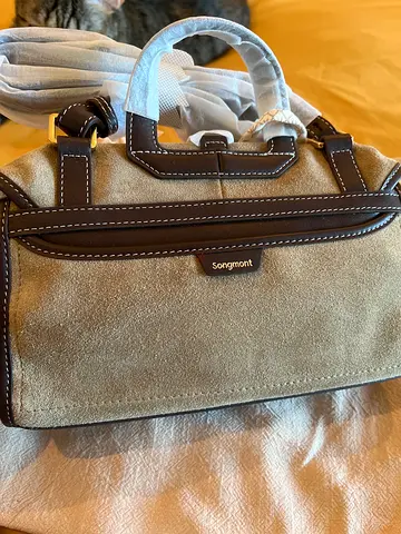 SONGMONT crossbody bag is beige suede and leather strap and trimmings. BRAND NEW.
