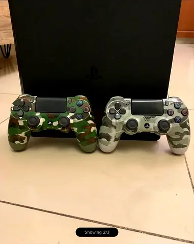 PS4 Slim – 2 Controllers + Charging Dock + Power cable  (price can be negotiable)