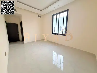 Brand-new 2BR hall apartment in Al Jurf 3, Ajman. Master rooms, 3 baths, central AC, balcony, free month, easy Dubai exit.