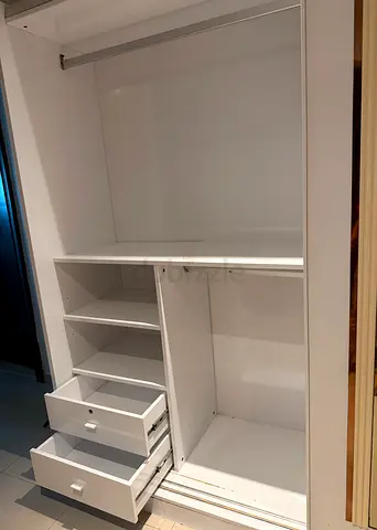 White Built-in Wardrobe with Shelves and Drawers