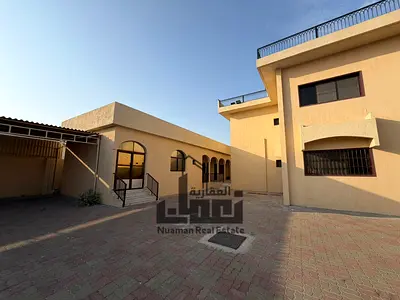 Luxury villa for sale in Al Khozamia Sharjah corner plot on two roads spacious high end family hom