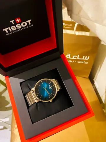 Tissot Gentleman-style Silver Mesh Watch with Blue Gradient Dial - Like New
