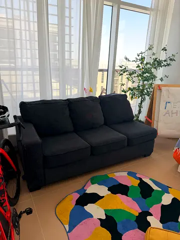 Dark grey 3-seater sofa in good condition