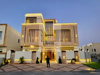 With a 15% down payment and no service charges, a luxurious corner villa directly opposite Al Hamidiya Park, featuring 7 rooms and a rooftop terrace,