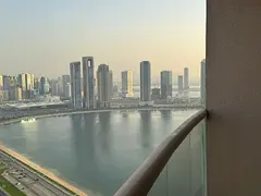 Luxurious two-bedroom apartment for annual rent in Al Khan area, Sharjah | Large laundry room | 3 ba