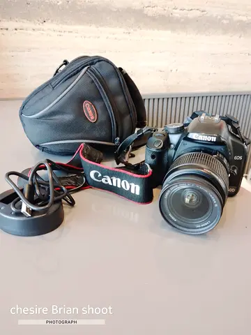 Canon EOS DSLR with 18-55mm Lens, Bag  Charger