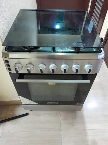 Stainless Steel 4-Burner Gas Stove with Oven (Used)