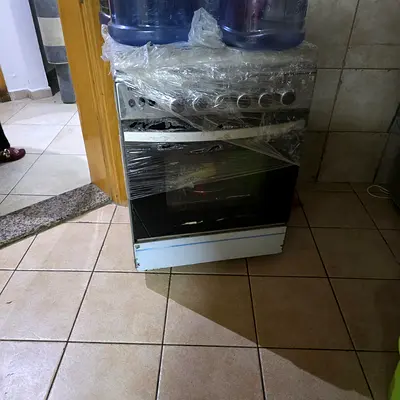 Used freestanding gas oven with stovetop - working condition