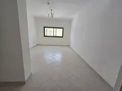 Very clean two-bedroom apartment in Al Majaz 1 with free AC, built-in wardrobes and landlord-paid co