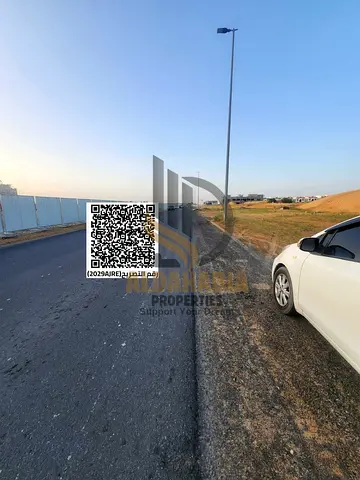 Prime commercial land available for sale in Al Helio 2, strategically located on a main road with e