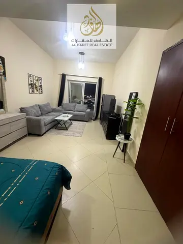 Monthly rent in Ajman, Al Nuaimiya 1, Al Shurooq Towers, near Al Hikma School, Stilo Cafe, furnished studio with new furniture, separate kitchen, balc