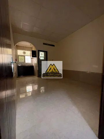 One of the best studios for annual rent in Al Jurf 2 – Ajman, featuring a spacious ground-floor layout with a semi-separated kitchen, beautiful view,